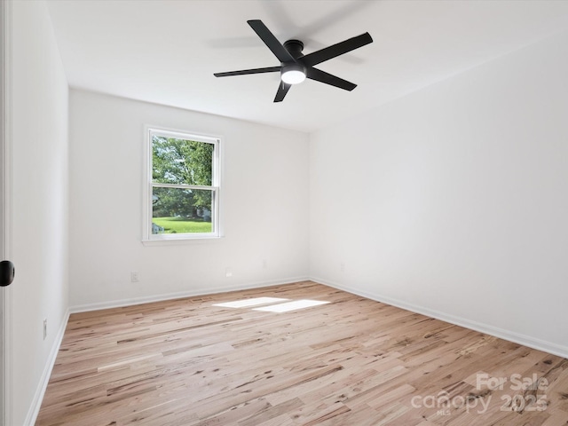10728 Forest Dr, Matthews, NC 28105 - spare room with wood finished floors and ceiling fan