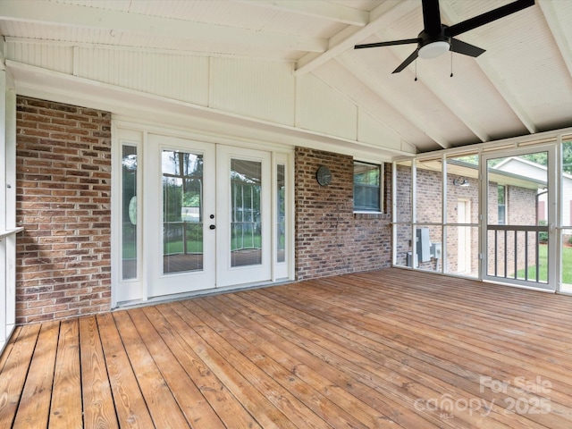 10728 Forest Dr, Matthews, NC 28105 - unfurnished sunroom featuring brick wall, french doors, ceiling fan, and hardwood / wood-style floors