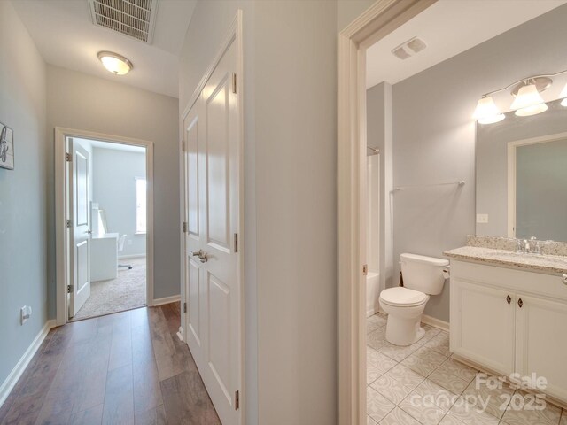 120 Prairie View Ct, Belmont, NC 28012 - bathroom featuring vanity, shower / tub combo, and wood finished floors