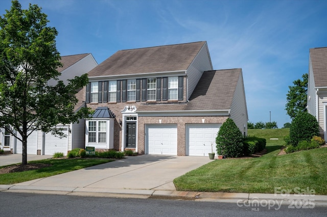 1498 Burrell Ave NW, Concord, NC 28027 - view of front of property featuring a front lawn, driveway, brick siding, and a shingled roof