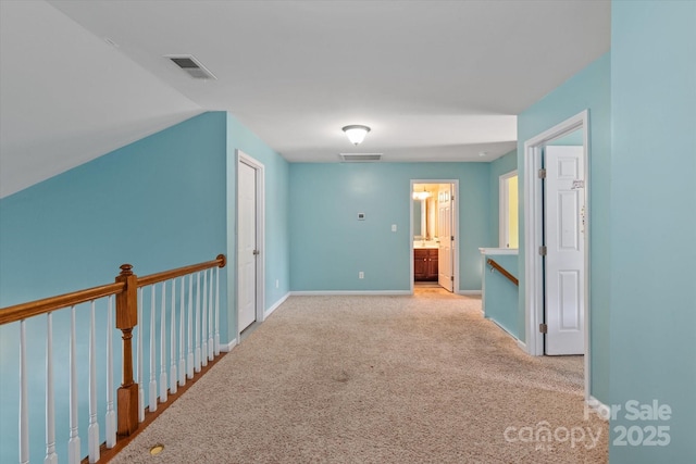 1498 Burrell Ave NW, Concord, NC 28027 - hallway featuring an upstairs landing and carpet floors