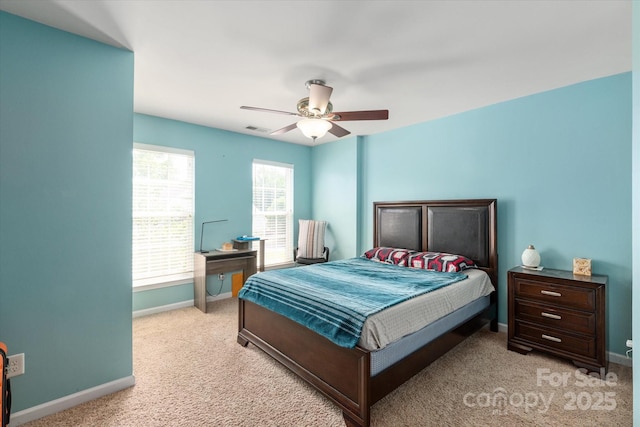 1498 Burrell Ave NW, Concord, NC 28027 - bedroom featuring light carpet and a ceiling fan