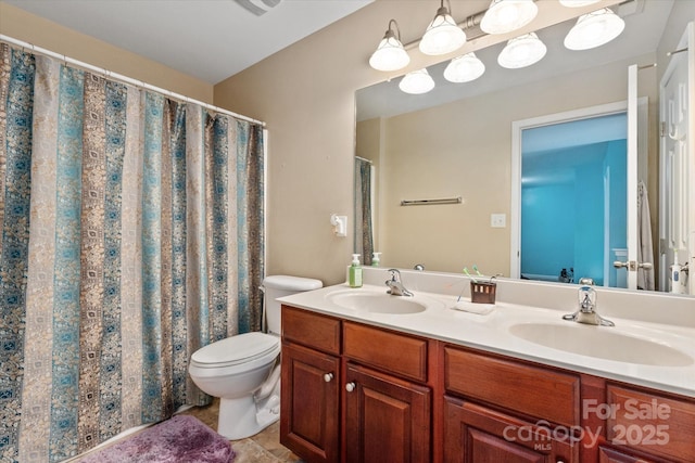 1498 Burrell Ave NW, Concord, NC 28027 - full bath with double vanity and tile patterned floors