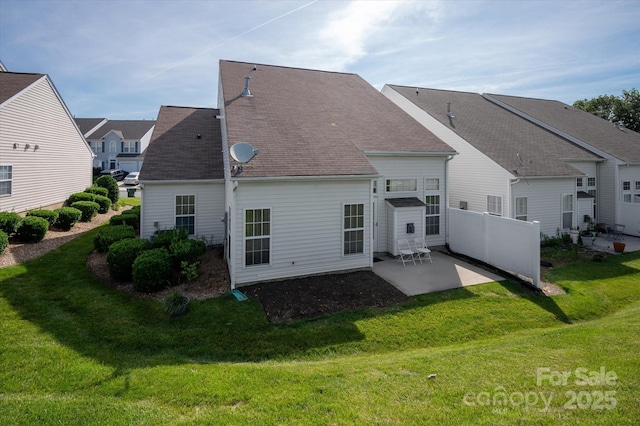 1498 Burrell Ave NW, Concord, NC 28027 - rear view of house featuring a patio area and a shingled roof