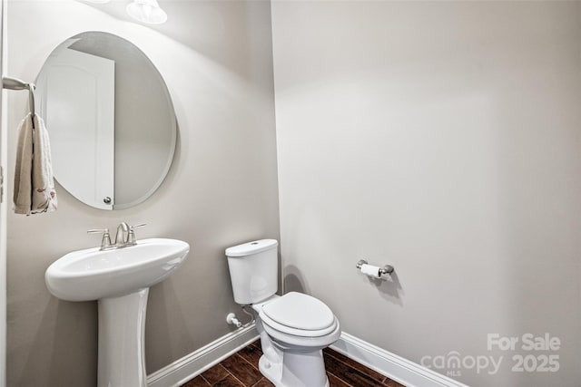 16547 Bastille Dr, Charlotte, NC 28278 - half bath featuring toilet and wood tiled floors