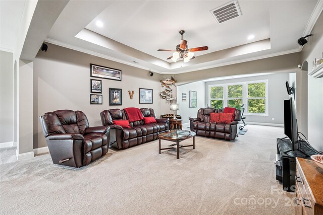 16547 Bastille Dr, Charlotte, NC 28278 - living room featuring a tray ceiling, light colored carpet, ceiling fan, crown molding, and recessed lighting