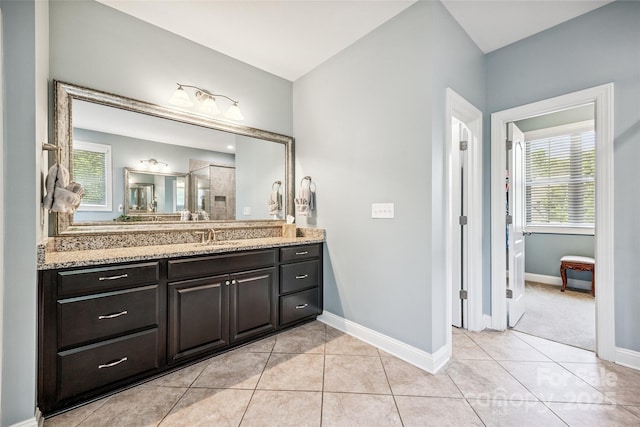 16547 Bastille Dr, Charlotte, NC 28278 - bathroom with vanity, tile patterned flooring, and tiled shower