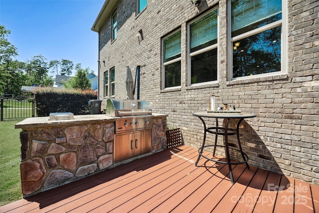16547 Bastille Dr, Charlotte, NC 28278 - wooden terrace featuring an outdoor kitchen