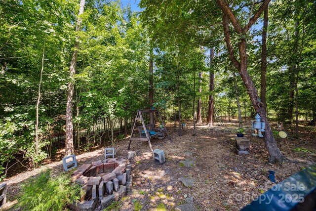 16547 Bastille Dr, Charlotte, NC 28278 - view of yard with a fire pit
