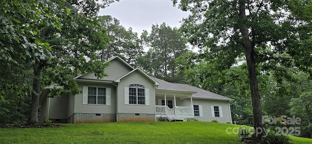 221 Flat Branch Trl, Mill Spring, NC 28756 - view of front facade featuring crawl space, covered porch, and a front lawn