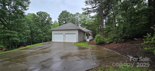 221 Flat Branch Trl, Mill Spring, NC 28756 - garage featuring concrete driveway