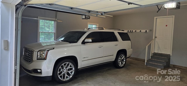 221 Flat Branch Trl, Mill Spring, NC 28756 - garage featuring a garage door opener