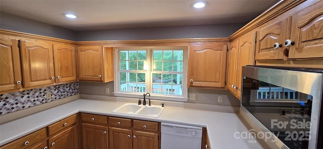 221 Flat Branch Trl, Mill Spring, NC 28756 - kitchen featuring dishwasher, light countertops, brown cabinets, and recessed lighting