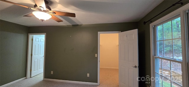 221 Flat Branch Trl, Mill Spring, NC 28756 - unfurnished bedroom featuring carpet flooring and ceiling fan