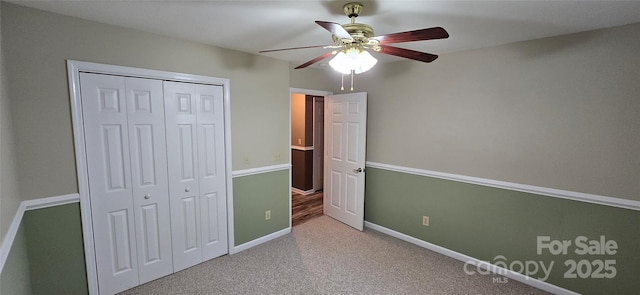 221 Flat Branch Trl, Mill Spring, NC 28756 - unfurnished bedroom with a closet, carpet flooring, and a ceiling fan