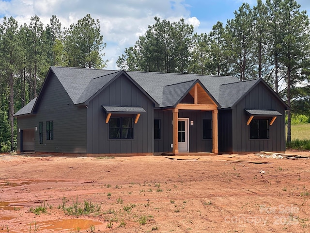 148 Sellers Rd, Kings Mountain, NC 28086 - modern inspired farmhouse with a shingled roof, board and batten siding, and covered porch