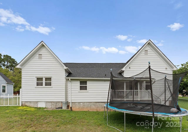 515 N Main Gq St, Granite Quarry, NC 28146 - rear view of house with a trampoline and roof with shingles