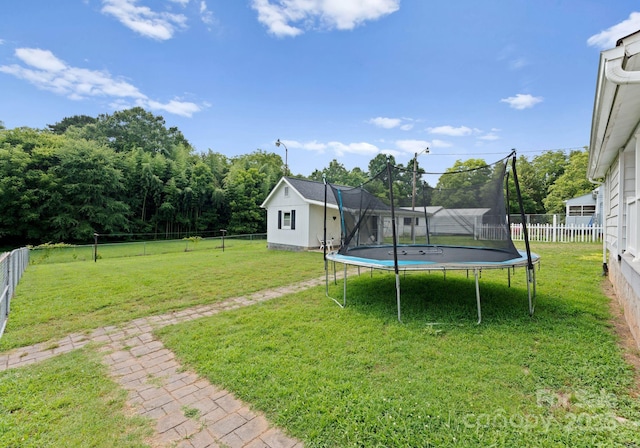 515 N Main Gq St, Granite Quarry, NC 28146 - fenced backyard with a trampoline