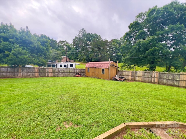 803 Bannon Pl, Lenoir, NC 28645 - fenced backyard with a storage unit