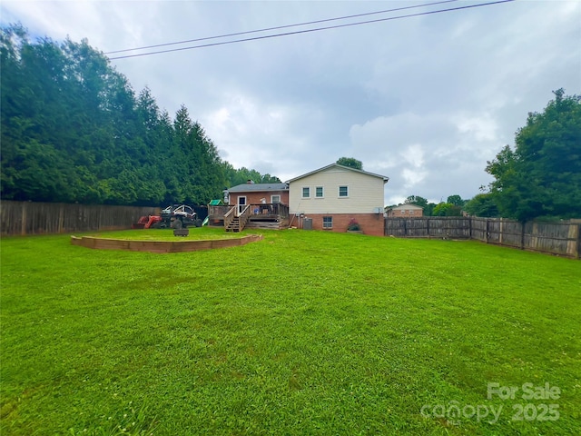 803 Bannon Pl, Lenoir, NC 28645 - fenced backyard with a deck