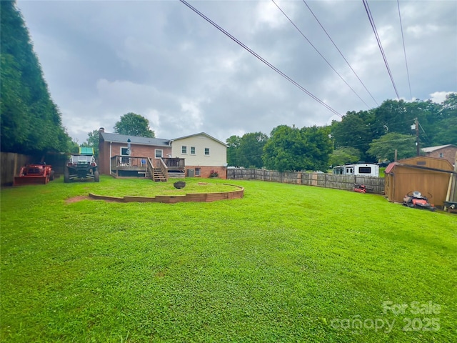 803 Bannon Pl, Lenoir, NC 28645 - fenced backyard featuring a storage shed and a wooden deck