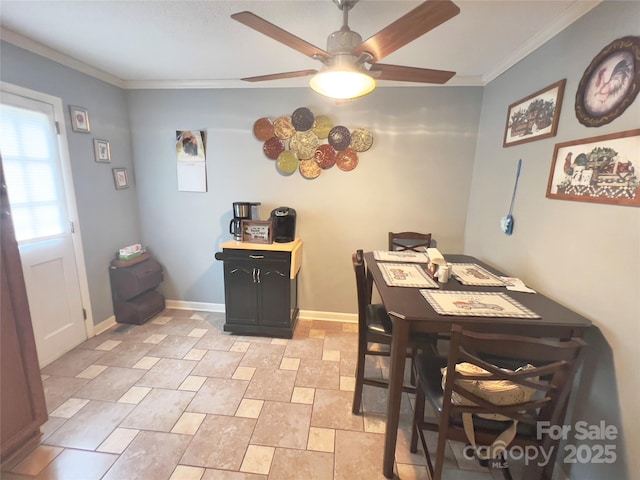 803 Bannon Pl, Lenoir, NC 28645 - dining room with ceiling fan, crown molding, and light stone finish floors