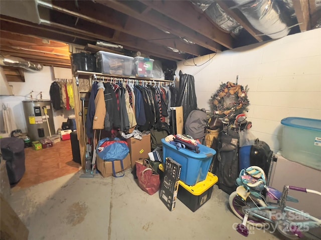 803 Bannon Pl, Lenoir, NC 28645 - unfinished below grade area with electric water heater and concrete block wall