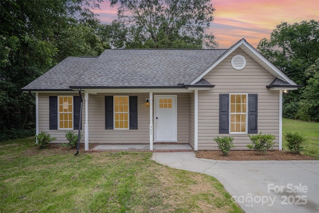 903 Brookdale St, Kannapolis, NC 28083 - single story home featuring a porch, a front yard, and a shingled roof