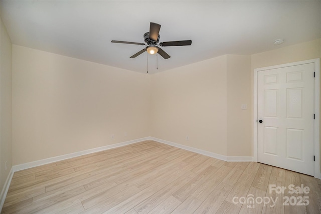 903 Brookdale St, Kannapolis, NC 28083 - empty room with light wood finished floors, a ceiling fan, and a smoke detector