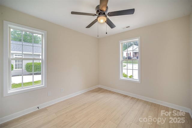 903 Brookdale St, Kannapolis, NC 28083 - spare room with wood finished floors and a ceiling fan