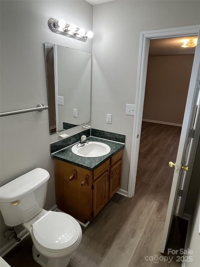 1714 Maribel Ave, Charlotte, NC 28216 - half bath featuring wood finished floors and vanity