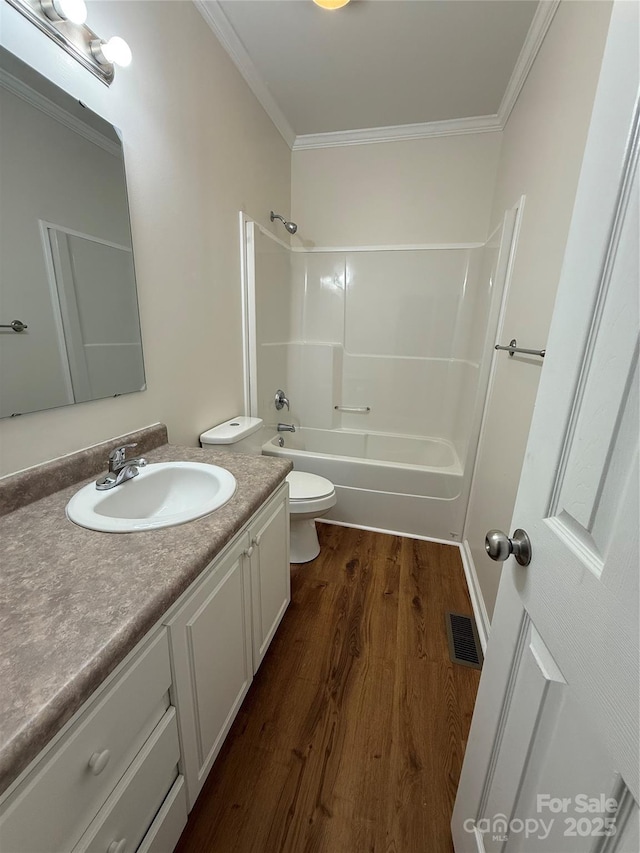 40287 Palmerville Rd, New London, NC 28127 - bathroom with vanity, wood finished floors, ornamental molding, and shower / bathtub combination