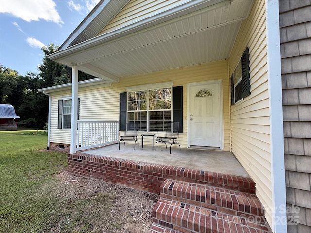 40287 Palmerville Rd, New London, NC 28127 - property entrance with covered porch and a lawn