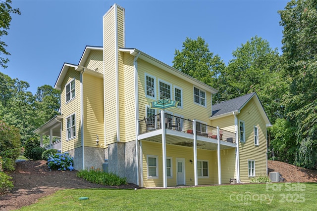 3 Chickadee Ln, Fairview, NC 28730 - back of property with a lawn and a chimney