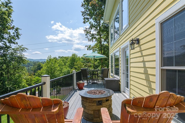 3 Chickadee Ln, Fairview, NC 28730 - deck with an outdoor fire pit and outdoor dining area