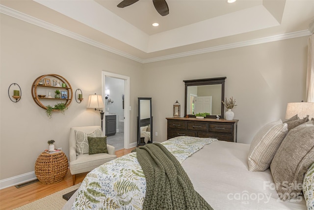 3 Chickadee Ln, Fairview, NC 28730 - bedroom featuring a tray ceiling, wood finished floors, ornamental molding, recessed lighting, and connected bathroom