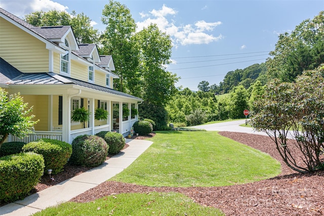 3 Chickadee Ln, Fairview, NC 28730 - view of green lawn with a porch