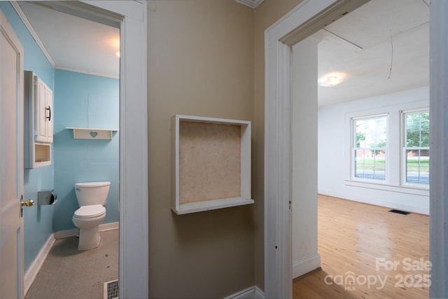 357 N Main St, Mount Pleasant, NC 28124 - bathroom featuring ornamental molding and wood finished floors
