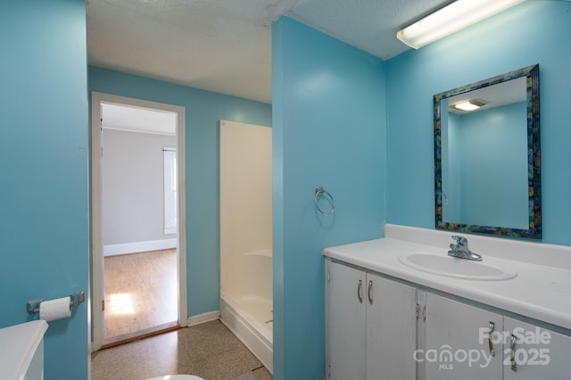 357 N Main St, Mount Pleasant, NC 28124 - full bathroom featuring vanity and a textured ceiling
