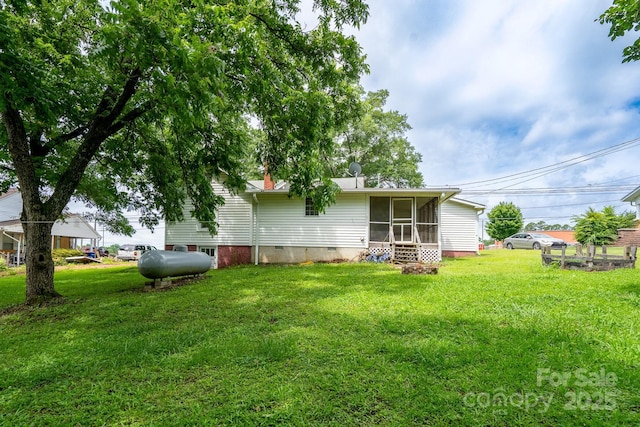 357 N Main St, Mount Pleasant, NC 28124 - rear view of house with a sunroom, a yard, and crawl space