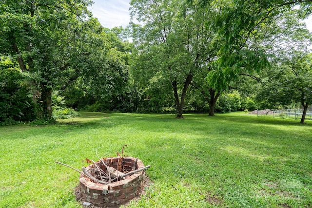 357 N Main St, Mount Pleasant, NC 28124 - view of yard with a fire pit