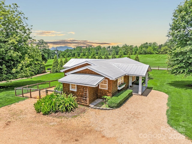 2784 Pea Ridge Rd, Mill Spring, NC 28756 - view of front of property featuring a metal roof, dirt driveway, and view of wooded area