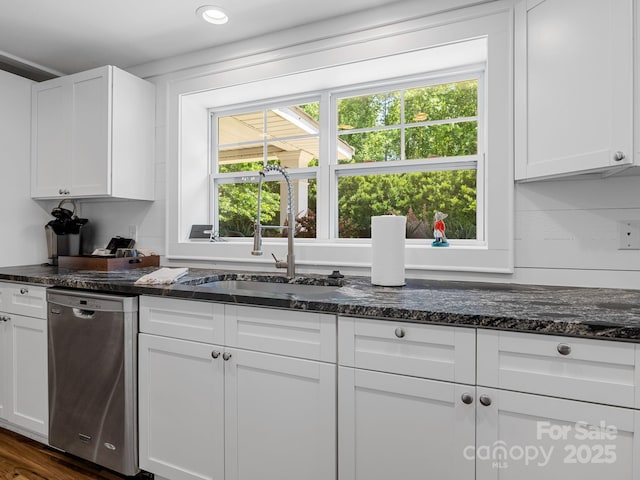 2784 Pea Ridge Rd, Mill Spring, NC 28756 - kitchen featuring stainless steel dishwasher, healthy amount of natural light, white cabinetry, and recessed lighting