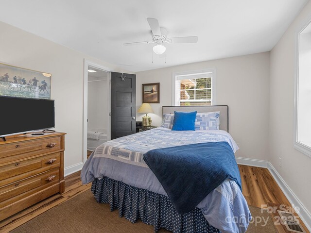 2784 Pea Ridge Rd, Mill Spring, NC 28756 - bedroom featuring wood finished floors and ceiling fan