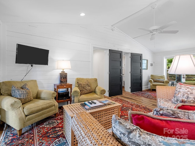 2784 Pea Ridge Rd, Mill Spring, NC 28756 - living area with wood finished floors, a ceiling fan, and wooden walls