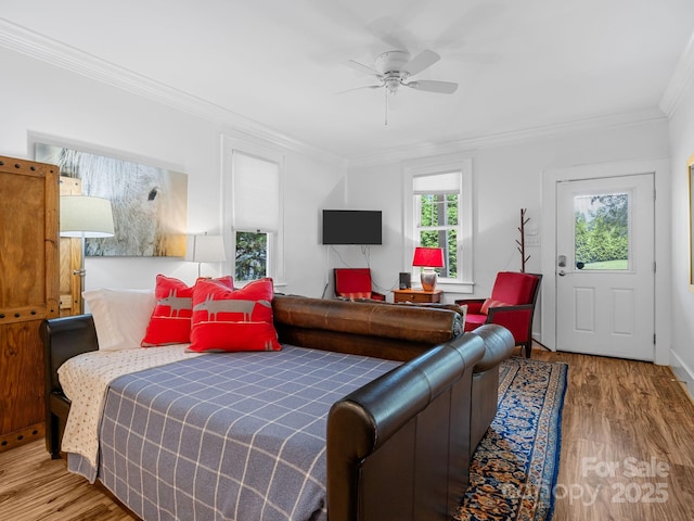 2784 Pea Ridge Rd, Mill Spring, NC 28756 - living room with wood finished floors, crown molding, and a ceiling fan