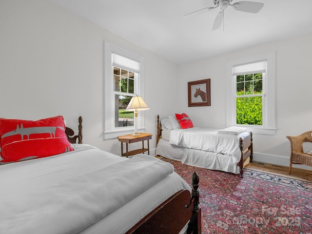 2784 Pea Ridge Rd, Mill Spring, NC 28756 - bedroom with wood finished floors and ceiling fan