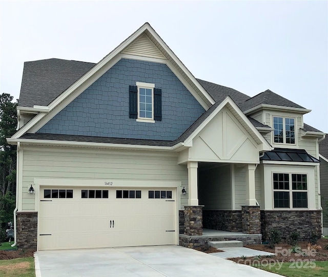 16432 Cozy Cove Rd, Charlotte, NC 28278 - craftsman-style home with stone siding, driveway, an attached garage, roof with shingles, and a standing seam roof