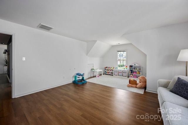 5005 Chestnut Knoll Ln, Charlotte, NC 28269 - recreation room with wood finished floors and vaulted ceiling