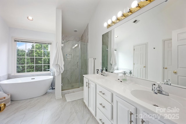 5005 Chestnut Knoll Ln, Charlotte, NC 28269 - full bath with a marble finish shower, double vanity, a soaking tub, and marble finish flooring
